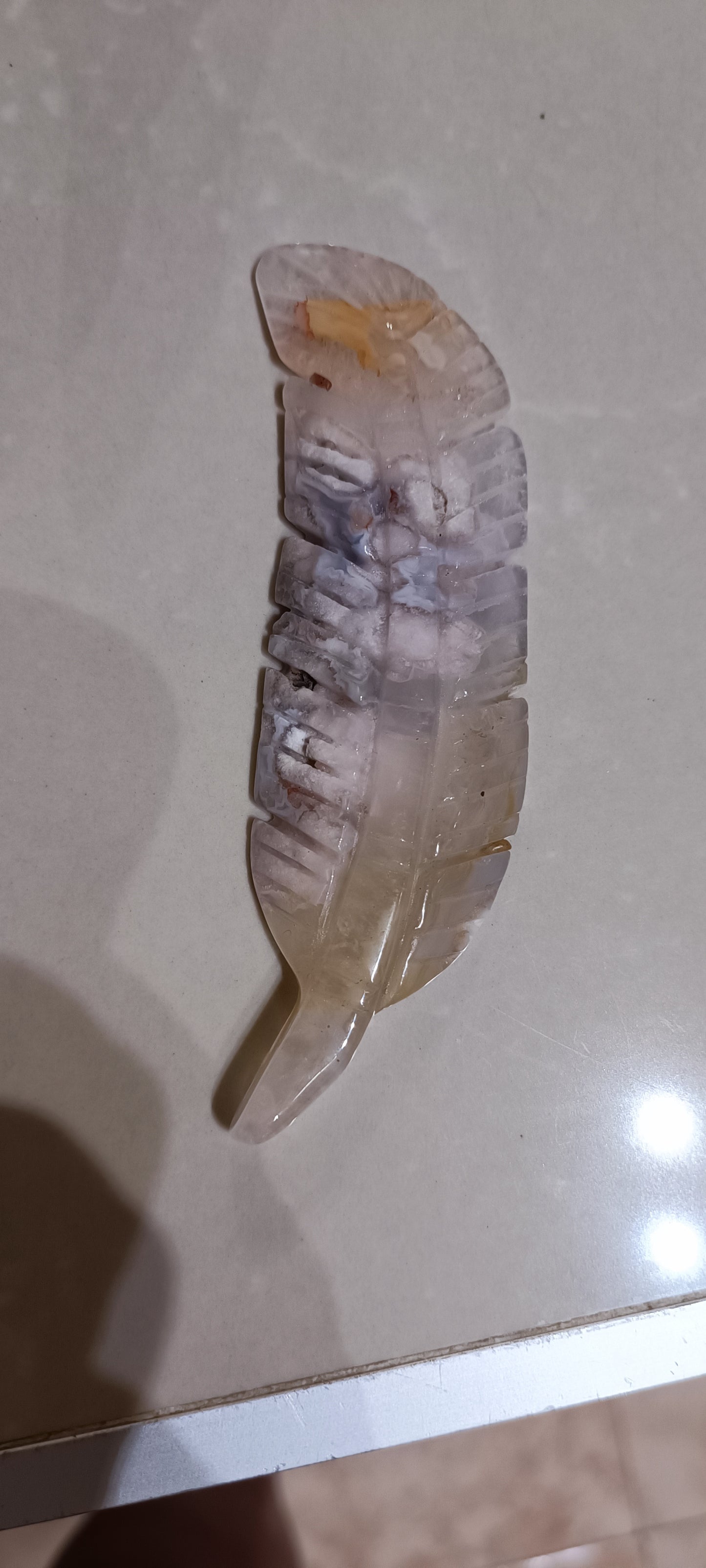 Pluma en varios minerales