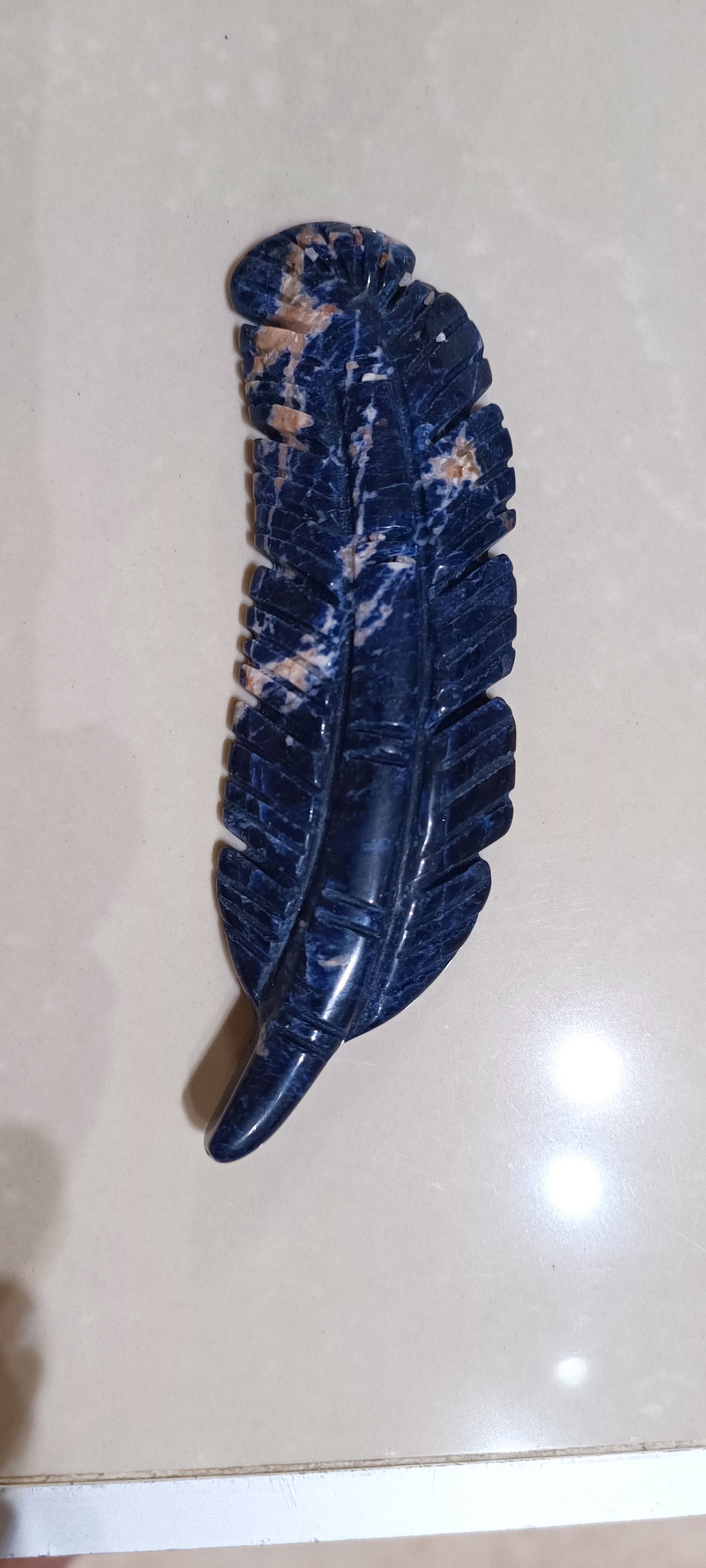 Pluma en varios minerales